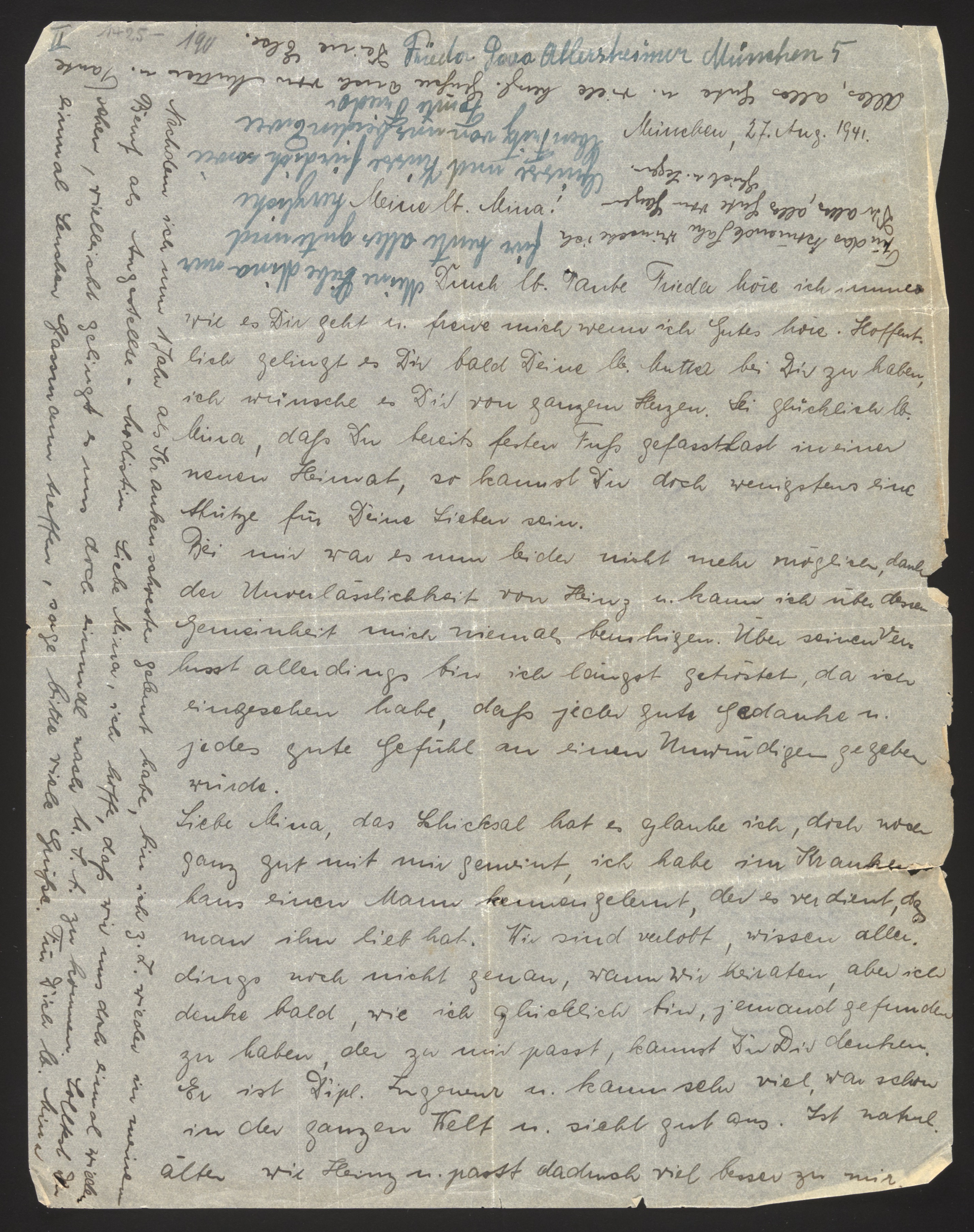 Handwritten letter in German Kurrent script, written upside-down on page (rot...